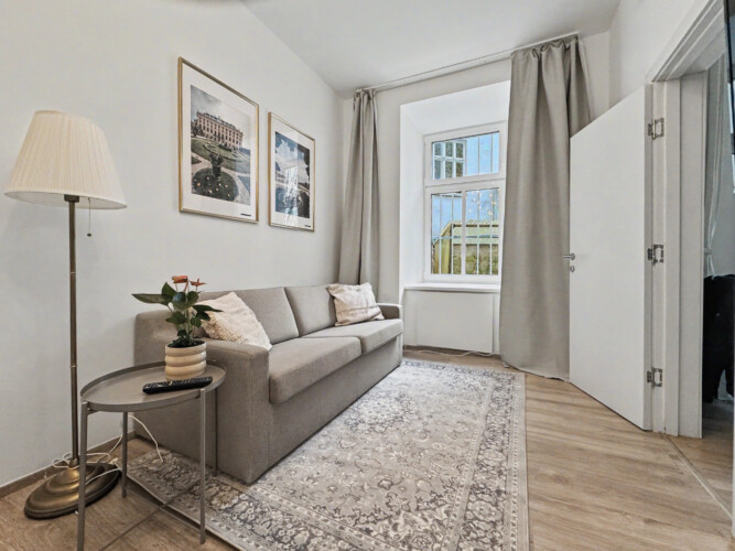 Comfortable double bed with modern bedding in ground floor Vienna Altbau apartment bedroom