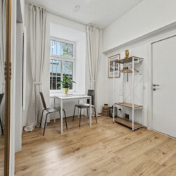 Separate WC with clean white fixtures in ground floor Vienna short-term rental