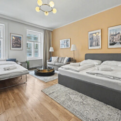 Sputnik ceiling lamp and high ceilings in elegant Vienna Altbau living room