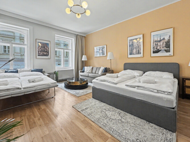 Sputnik ceiling lamp and high ceilings in elegant Vienna Altbau living room