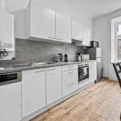 Air conditioning and modern furnishings in second bedroom of Vienna holiday rental