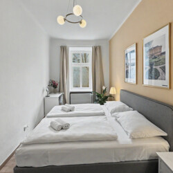 Coffee machine, microwave and kettle on kitchen counter in Vienna Altbau group apartment