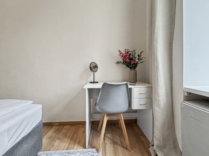 Junkers gas boiler and kitchen overview in spacious Vienna short-term rental