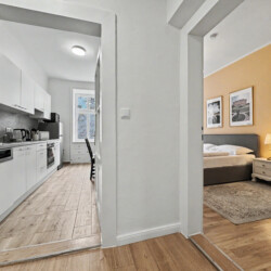 Double vanity with two sinks and large mirror in Vienna short-term rental bathroom