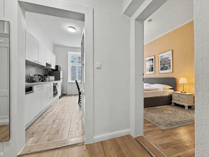 Double vanity with two sinks and large mirror in Vienna short-term rental bathroom