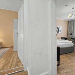 Washing machine in bathroom of spacious Vienna holiday rental for 8 guests