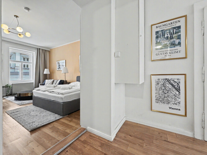 Checkerboard black and white bathroom floor in elegant Vienna Altbau apartment